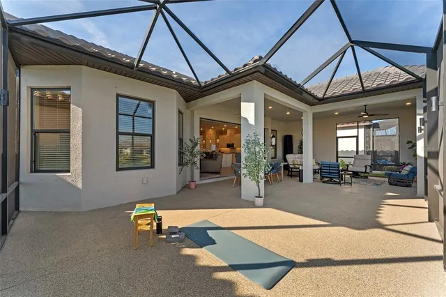 a living room with furniture kitchen view and a table