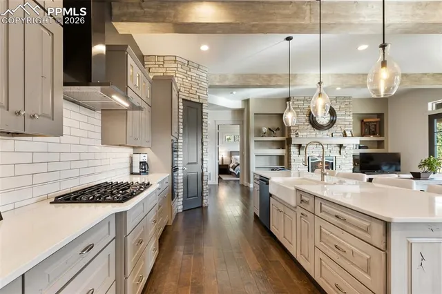 a spacious bathroom with a large tub sink and mirror