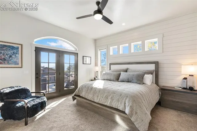 a bedroom with a bed and walk in closet