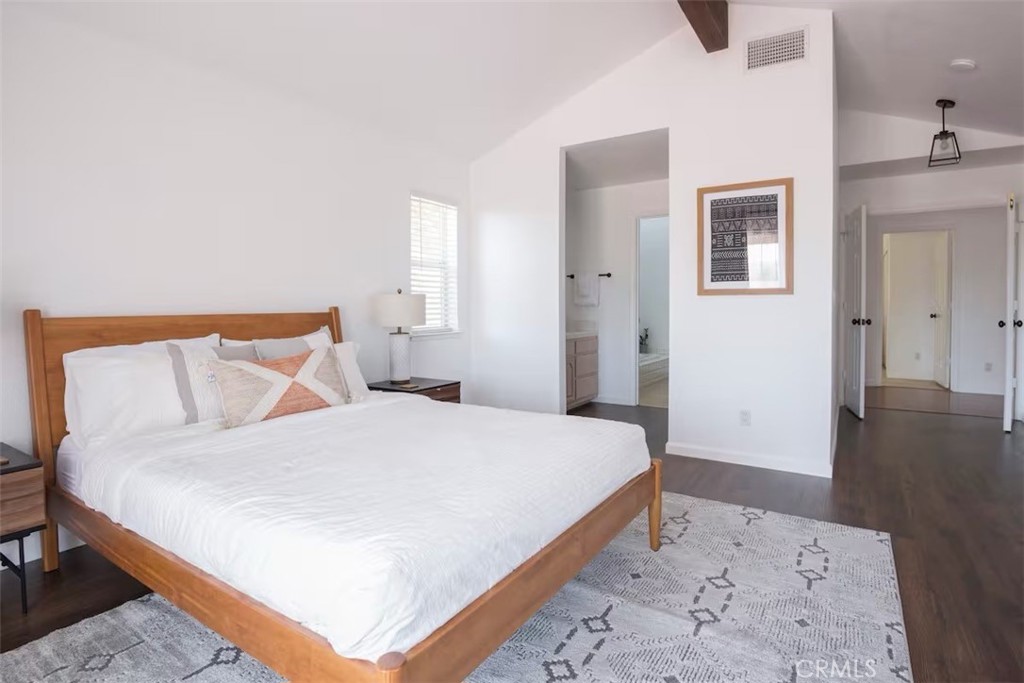 40584 Indian Springs Road Oakhurst, CA 93644 - Photo 12 of 21 a bedroom with a bed and wooden floor