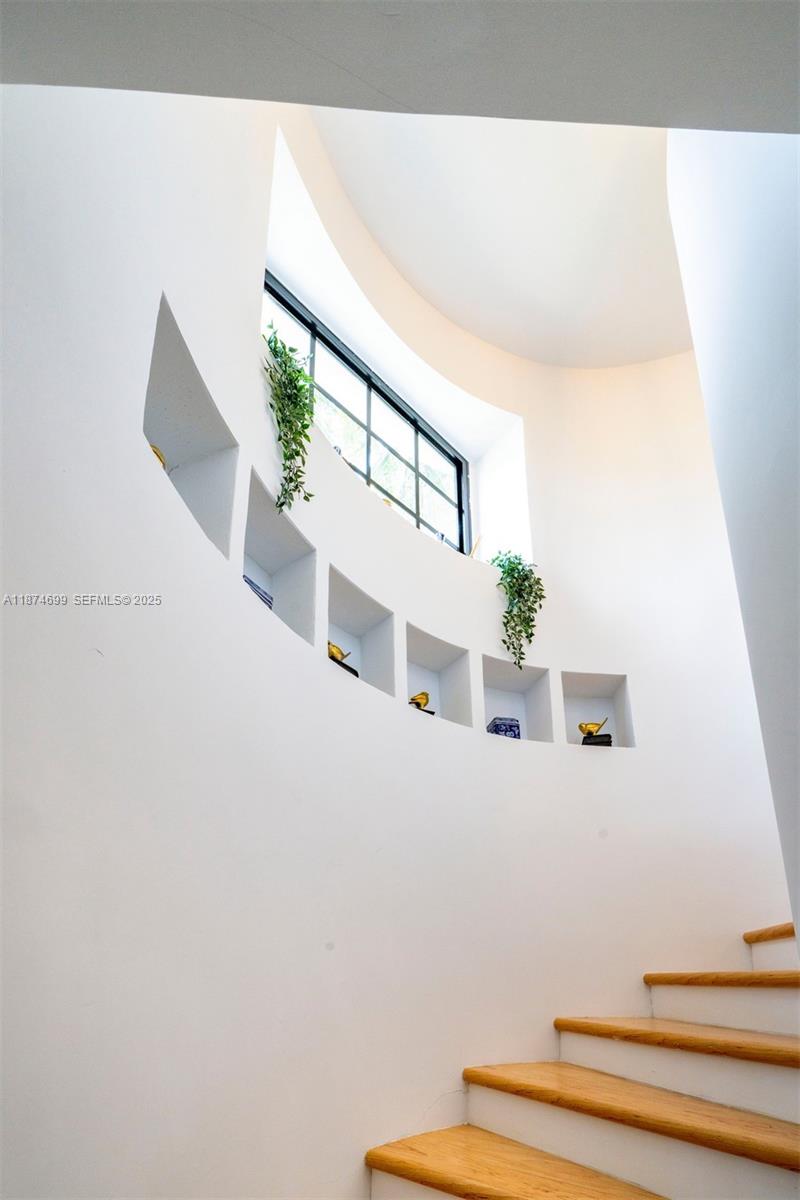 5149 Alton Road Miami Beach, FL 33140 - Photo 24 of 39 Circular Stairwell