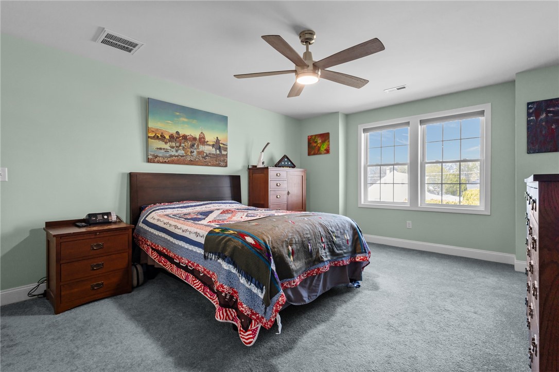 54 Carpenter Street Warwick, RI 02886 - Photo 14 of 42 Spacious, sunny primary bedroom
