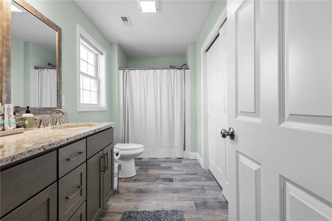 54 Carpenter Street Warwick, RI 02886 - Photo 18 of 42 En suite primary bath with walk-in closet