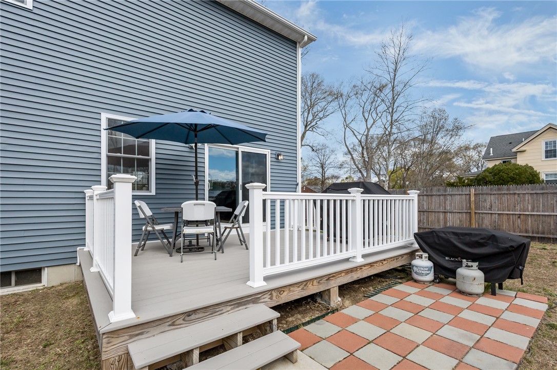 54 Carpenter Street Warwick, RI 02886 - Photo 35 of 42 Deck and patio adjacent to dining area