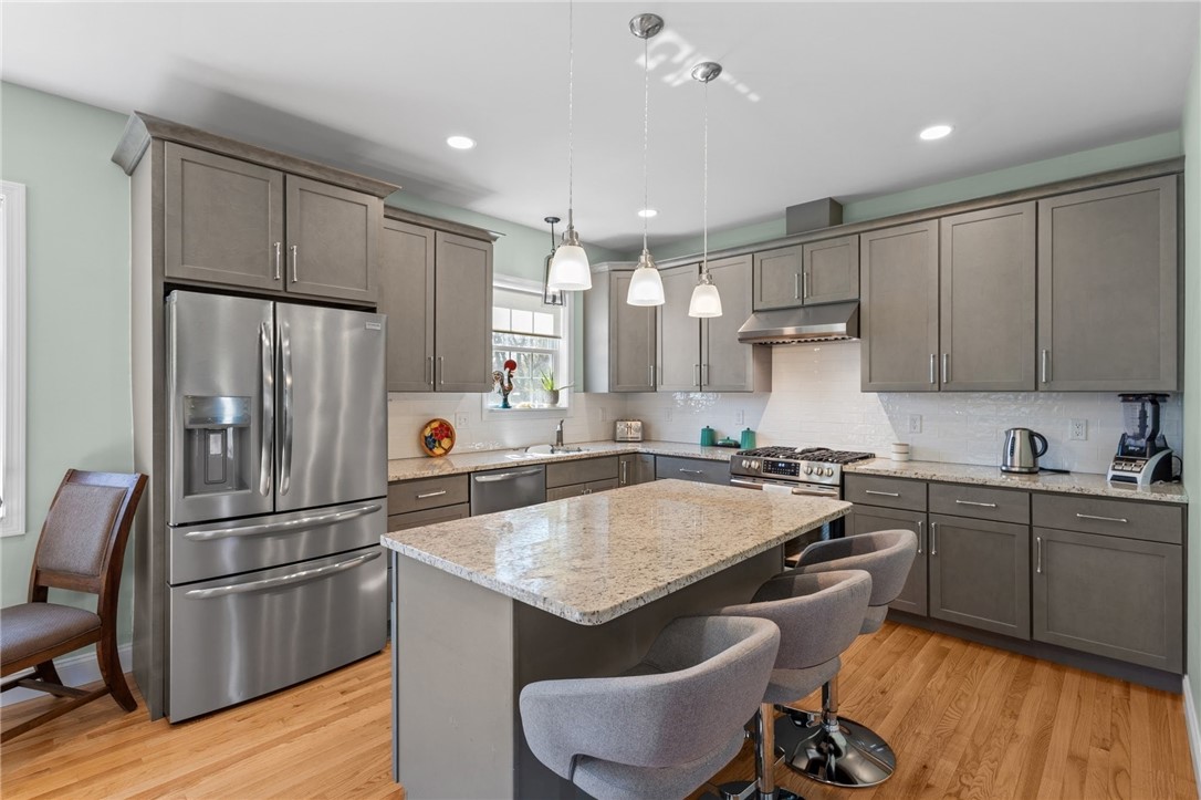 54 Carpenter Street Warwick, RI 02886 - Photo 4 of 42 Make your way to the open, modern kitchen