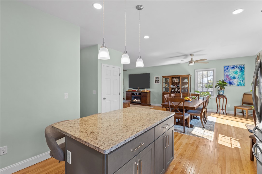 54 Carpenter Street Warwick, RI 02886 - Photo 7 of 42 Open kitchen / dining / living areas complete the first floor