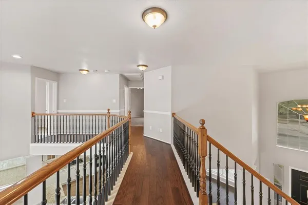 a view of a hallway view with staircase