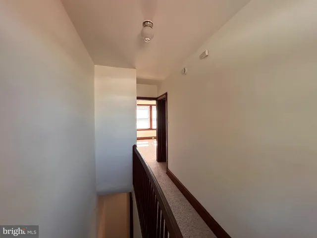 a view of a hallway with entryway