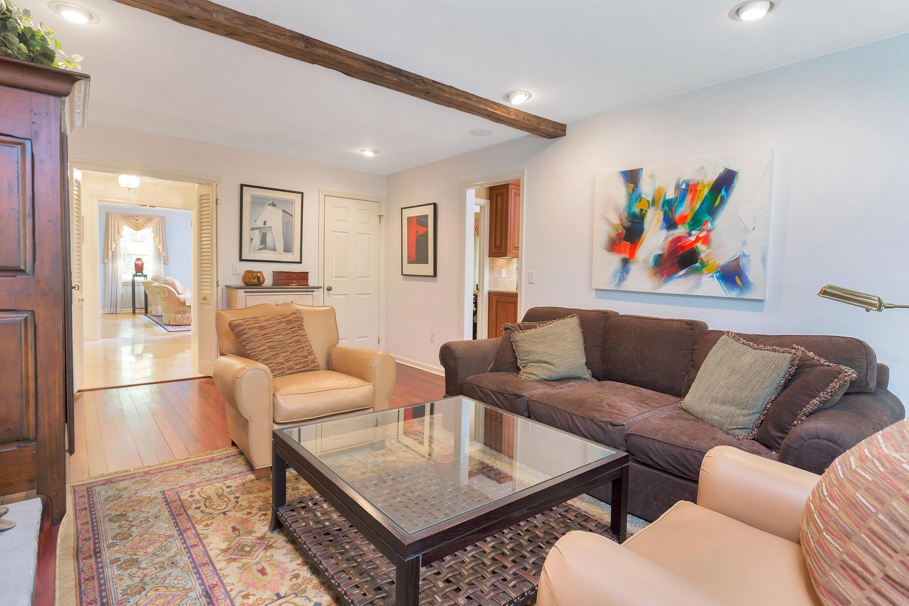 123 Tokeneke Road Darien, CT 06820 - Photo 11 of 23 a living room with furniture and a rug
