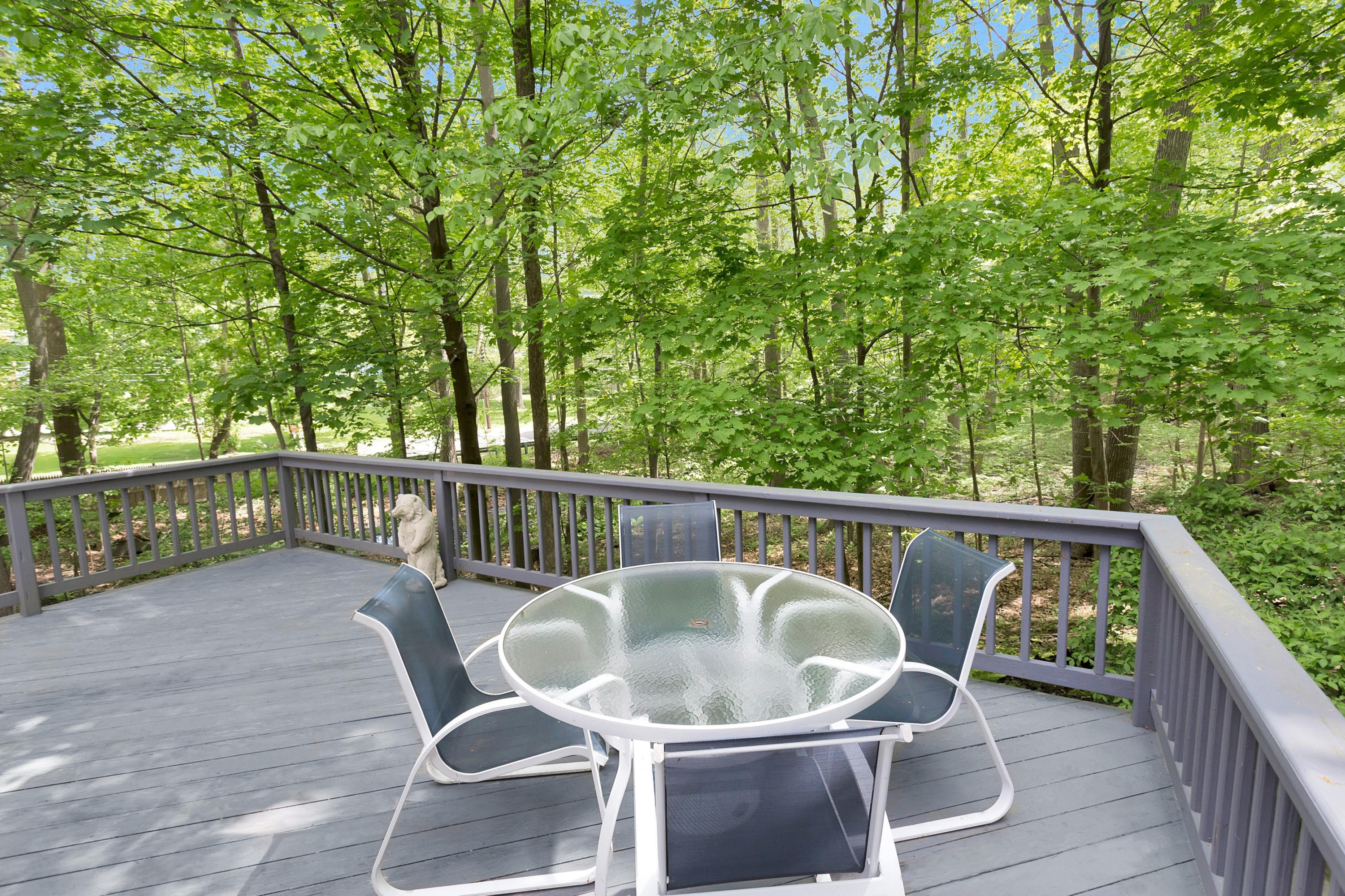 123 Tokeneke Road Darien, CT 06820 - Photo 6 of 23 a balcony with table and chairs