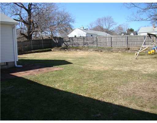 10 Fairhaven Road Cumberland, RI 02864 - Photo 16 of 16 Yard/Garden. Great flat fenced backyard