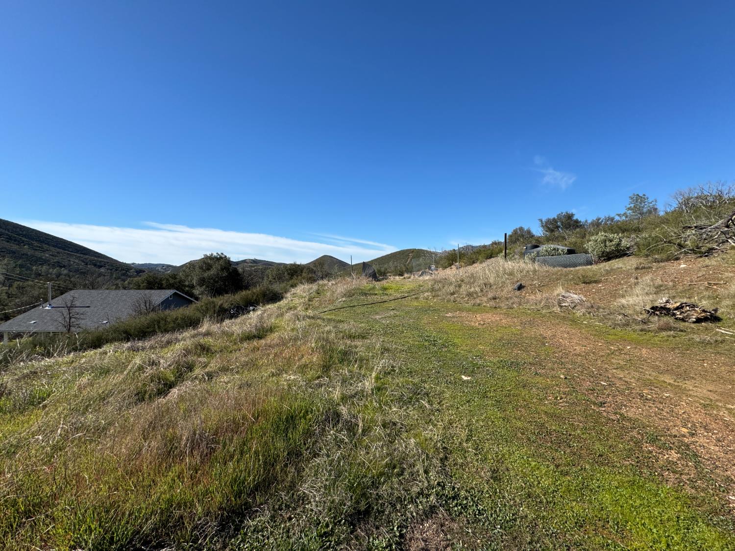 4968 Yaqui Gulch Road Mariposa, CA 95338 - Photo 22 of 28 a view of a mountain range with a lush green forest