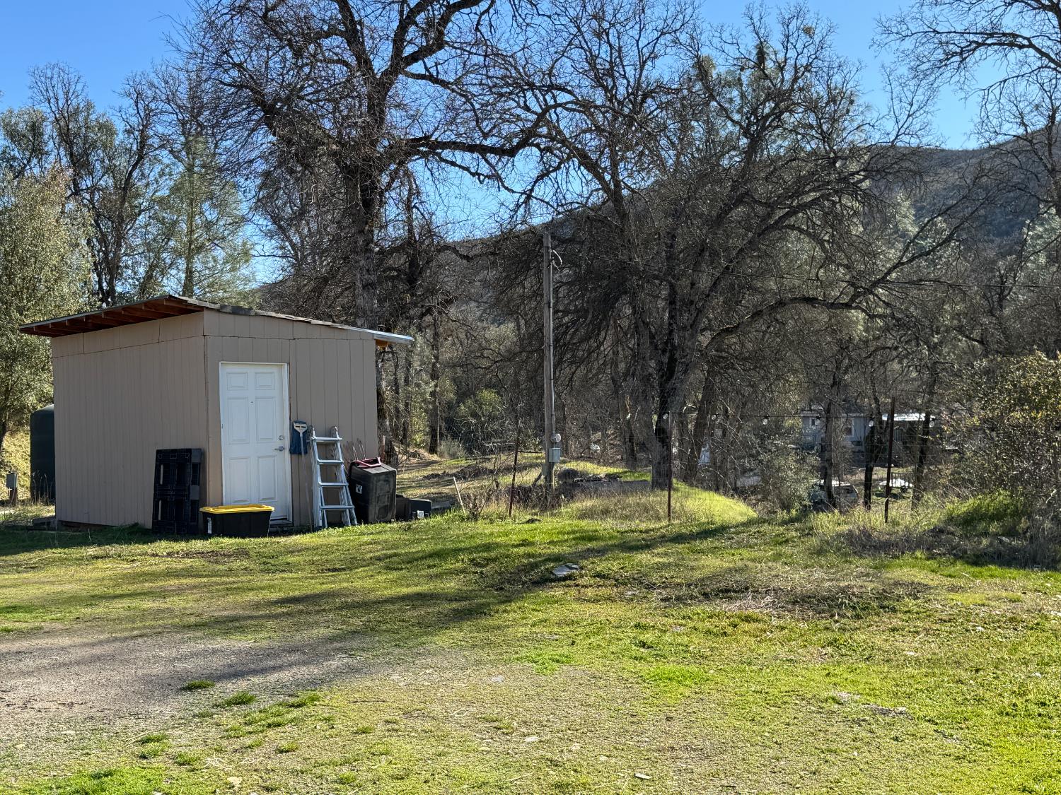 4968 Yaqui Gulch Road Mariposa, CA 95338 - Photo 27 of 28 a view of a house with swimming pool