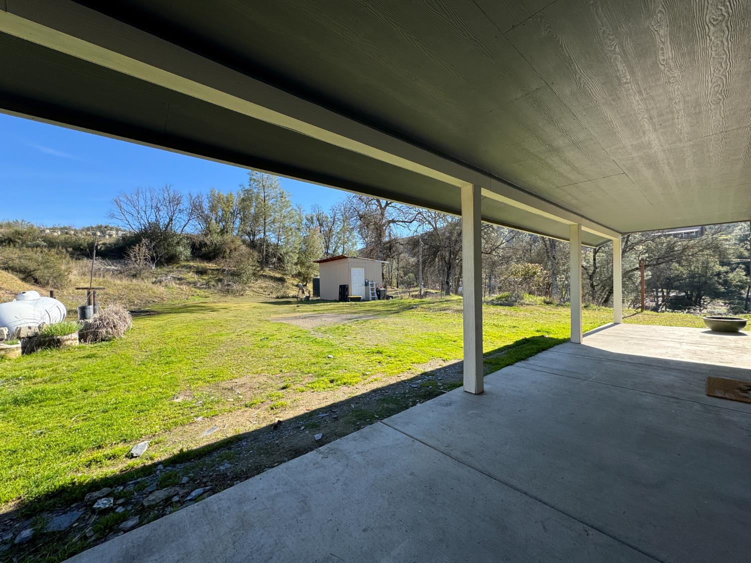 4968 Yaqui Gulch Road Mariposa, CA 95338 - Photo 5 of 28 a view of a swimming pool and outdoor space
