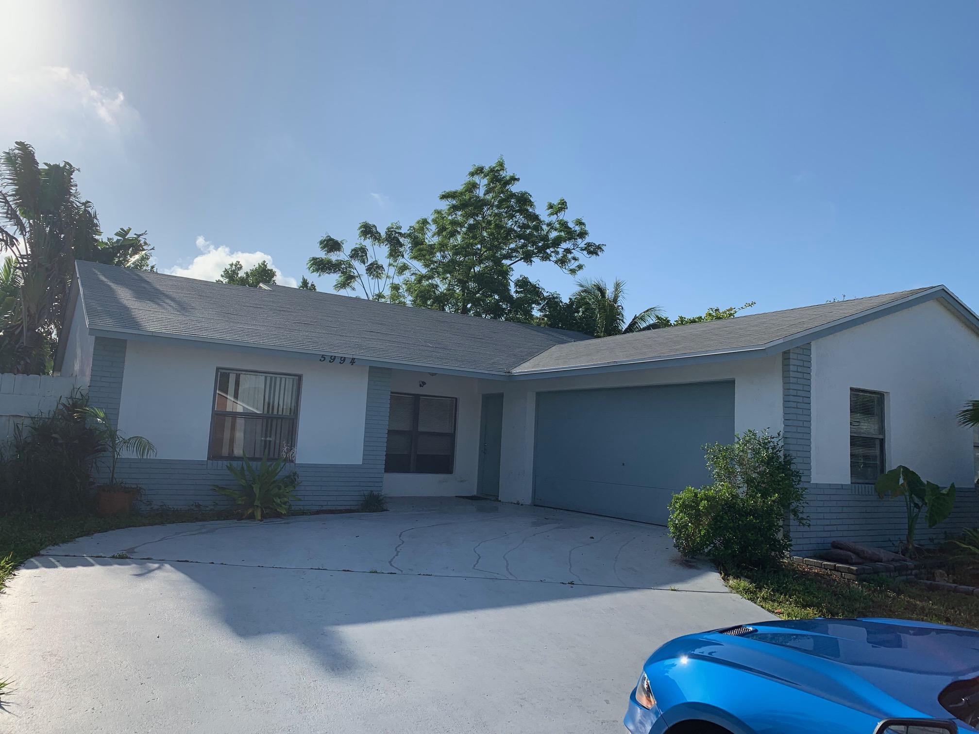5994 Triphammer Road Lake Worth, FL 33463 - Photo 1 of 6 Front