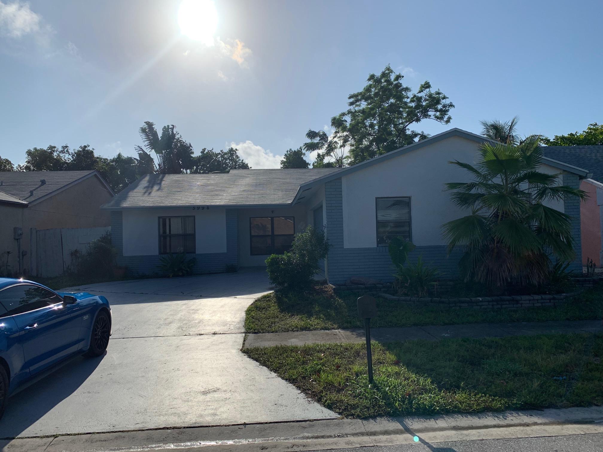5994 Triphammer Road Lake Worth, FL 33463 - Photo 2 of 6 Front 2