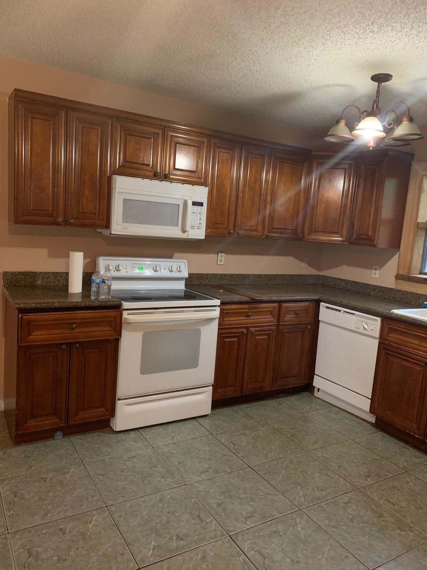 5994 Triphammer Road Lake Worth, FL 33463 - Photo 5 of 6 Kitchen 2