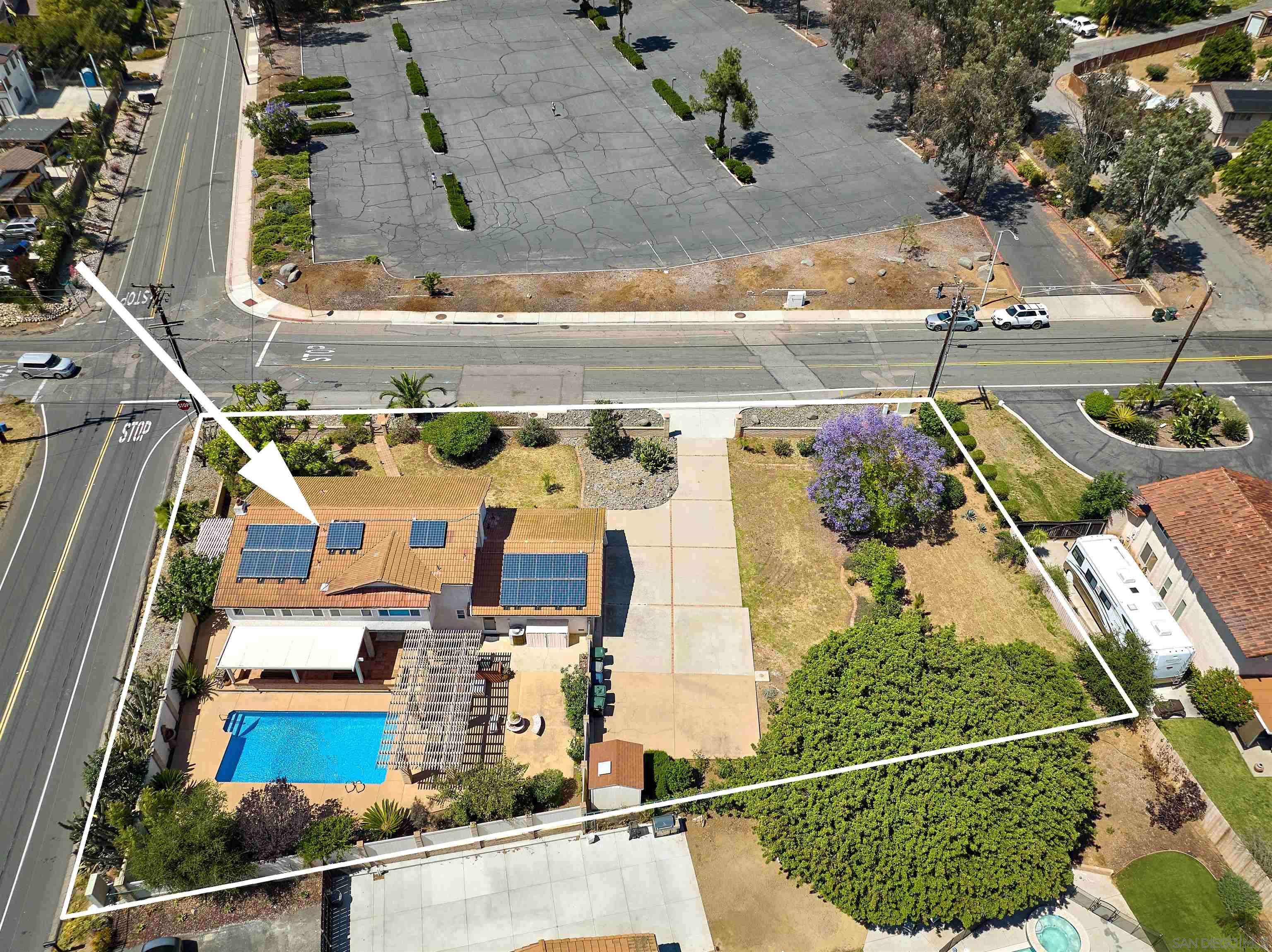 an aerial view of a houses with outdoor space