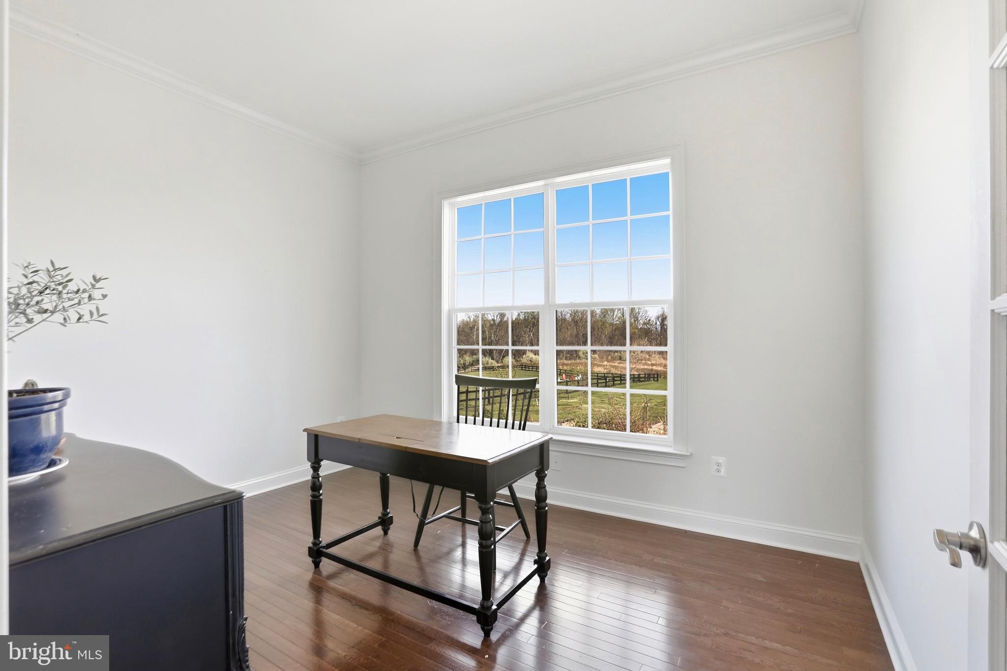 36972 Bridle Ridge Lane Purcellville, VA 20132 - Photo 20 of 44 a view of a workspace with furniture and a window