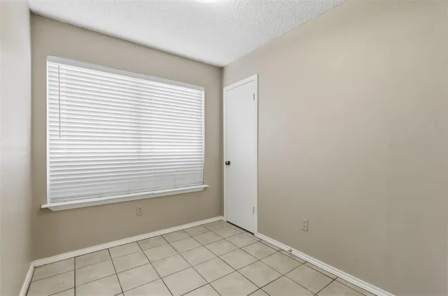 a view of an empty room with window