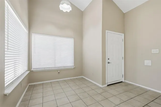 a view of an empty room with window