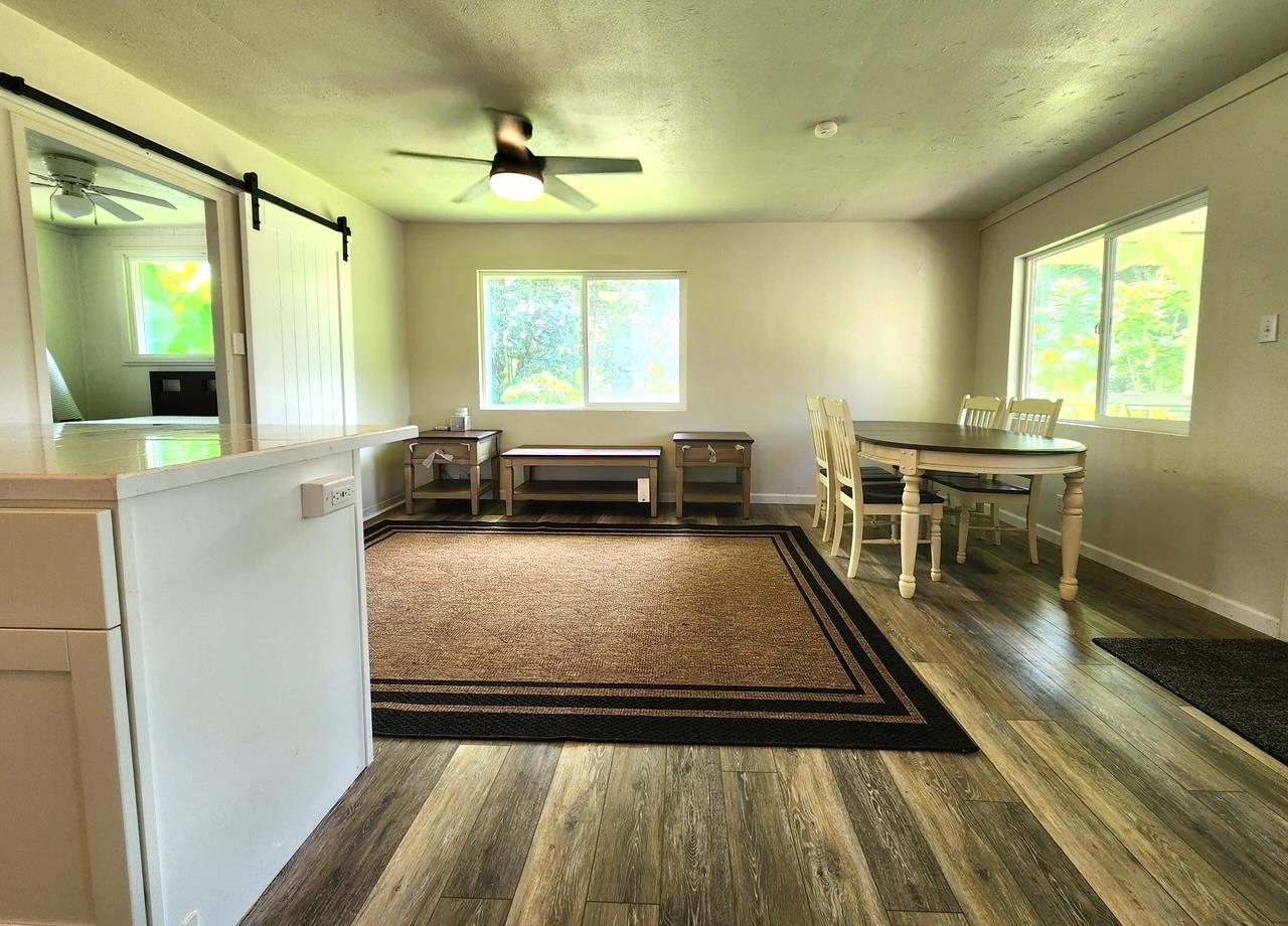 91 Wailua Road Haiku, HI 96708 - Photo 8 of 14 a view of a living room and dining room