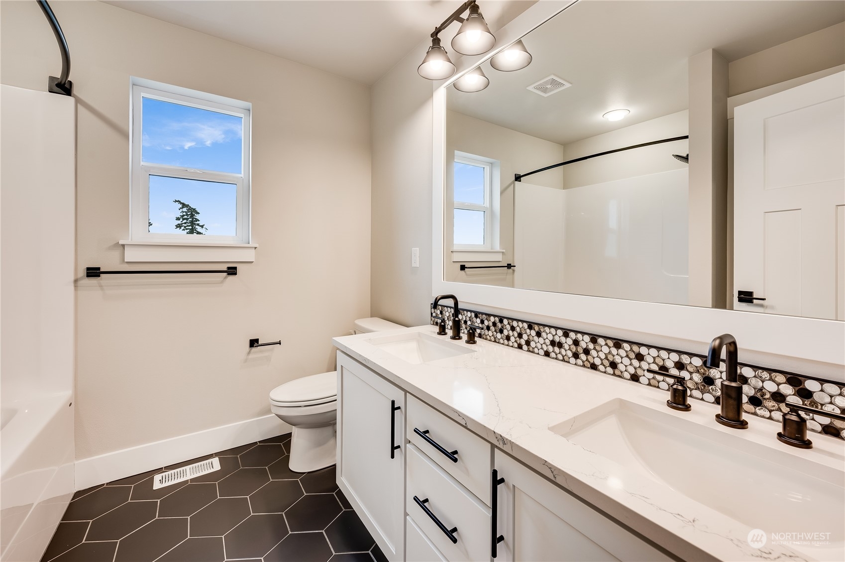 24326 43rd Drive Southeast Bothell, WA 98021 - Photo 23 of 35 a bathroom with a double vanity sink mirror and toilet