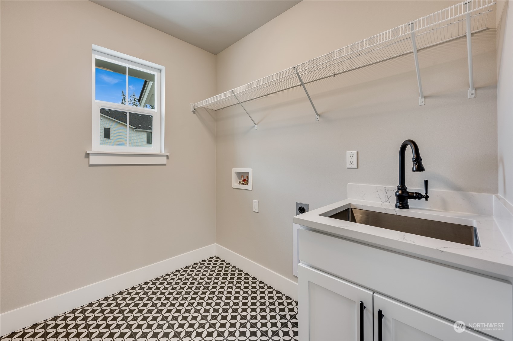 24326 43rd Drive Southeast Bothell, WA 98021 - Photo 25 of 35 a kitchen with a sink and a refrigerator