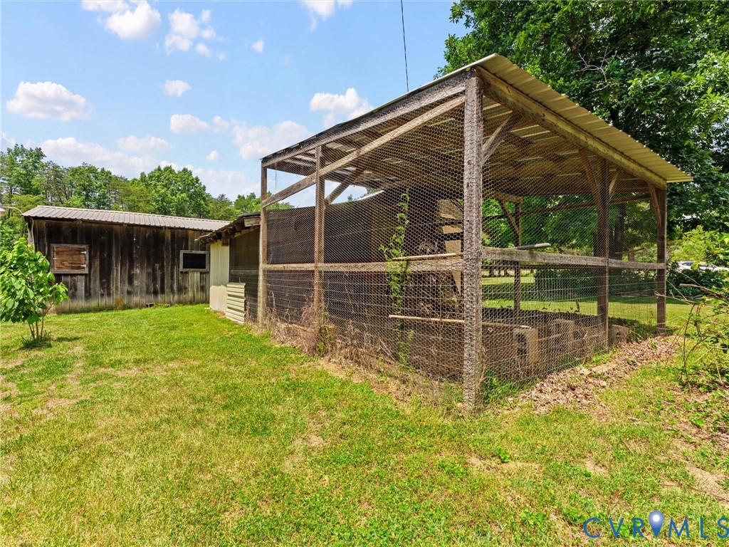 3607 Pacetown Road Sandy Hook, VA 23153 - Photo 20 of 33 Chicken coop with farmhouse tool shed