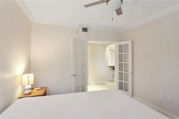 a bedroom with a bed and closet