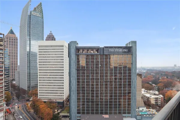 a view of a city with tall buildings