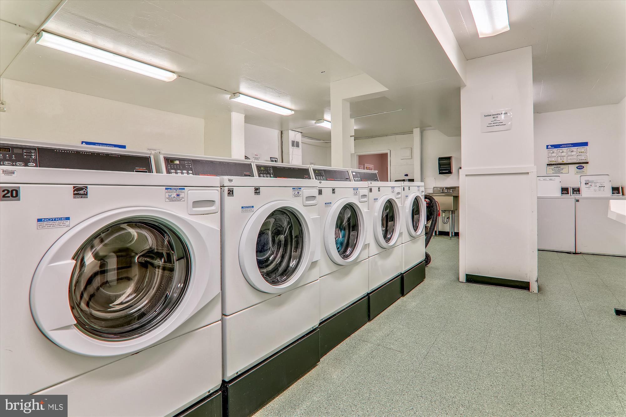 4000 Tunlaw Road Northwest, Unit 1003 Washington, DC 20007 - Photo 21 of 25 Bright and modern laundry facility.