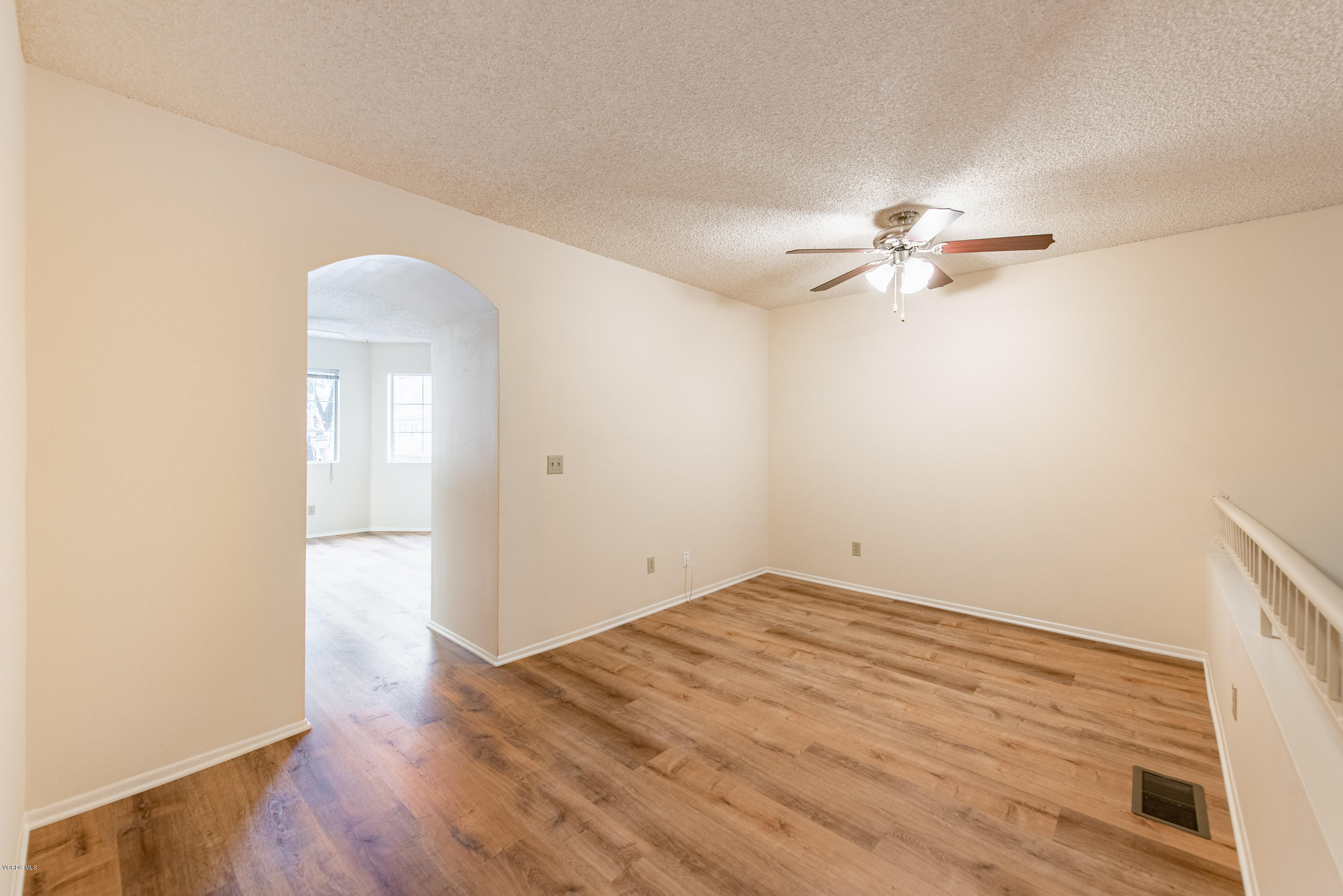 4975 Telephone Road Ventura, CA 93003 - Photo 17 of 31 wooden floor in an empty room with a window