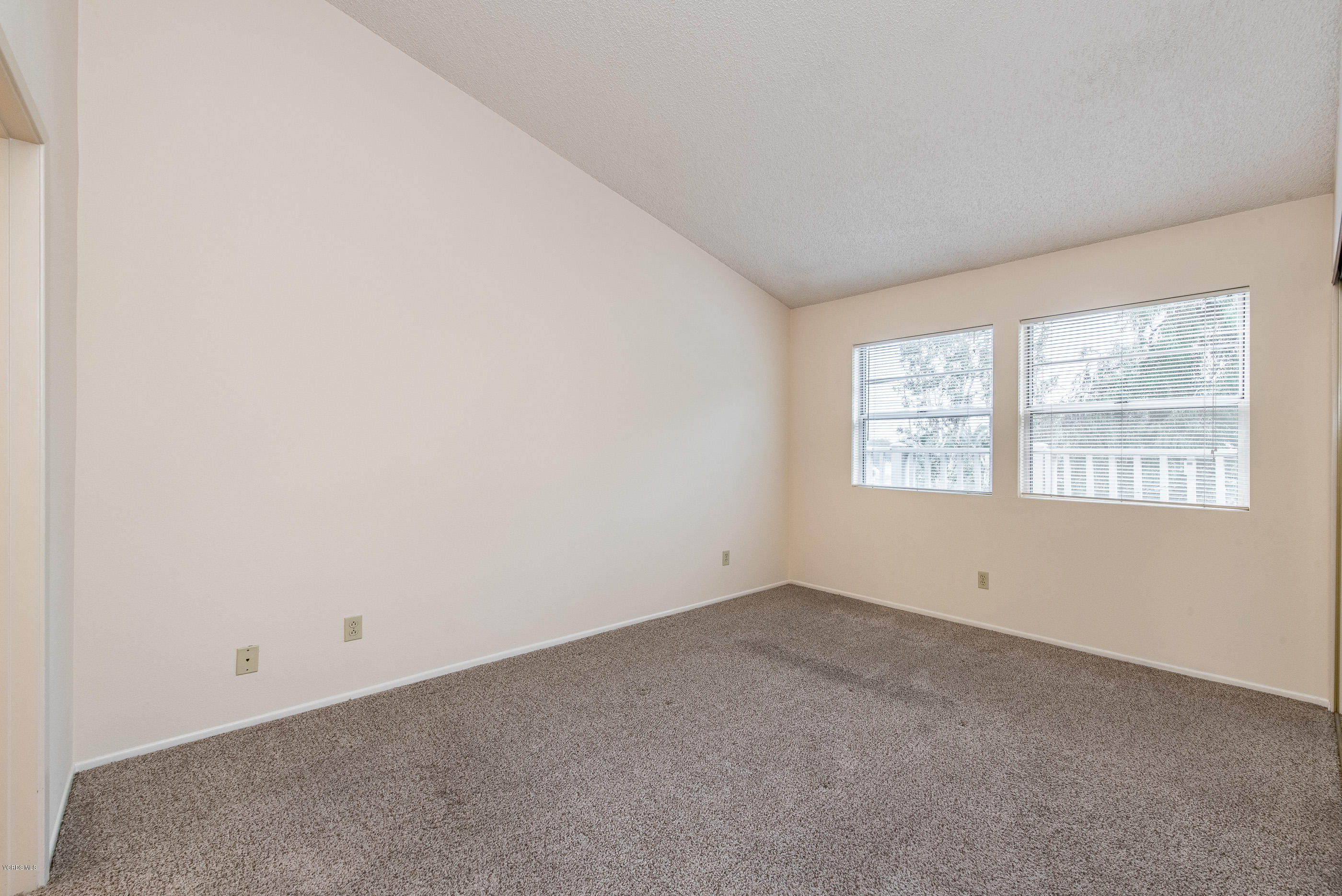 4975 Telephone Road Ventura, CA 93003 - Photo 20 of 31 an empty room with a window