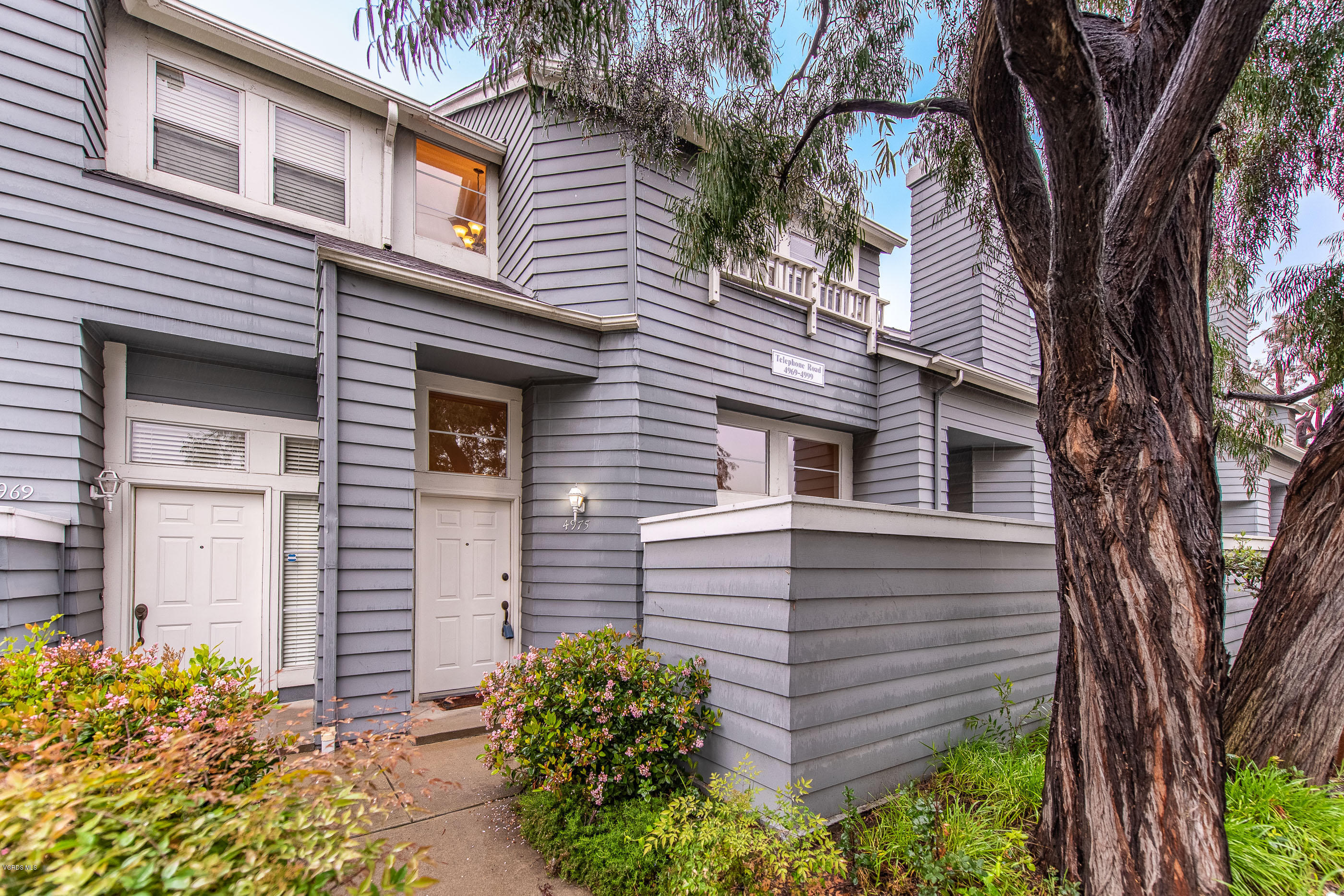 4975 Telephone Road Ventura, CA 93003 - Photo 3 of 31 a view of a house with a yard