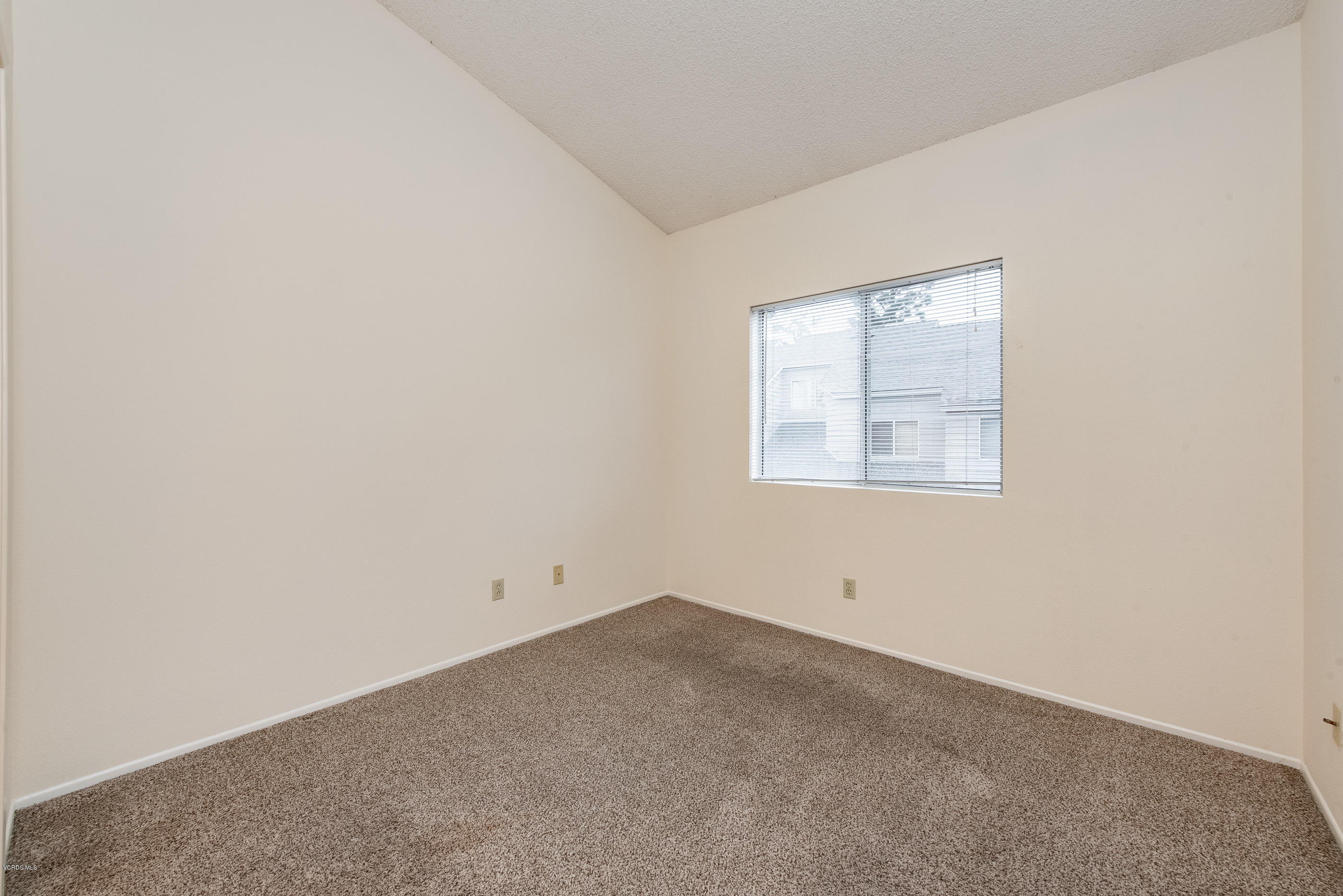 4975 Telephone Road Ventura, CA 93003 - Photo 22 of 31 an empty room with a window