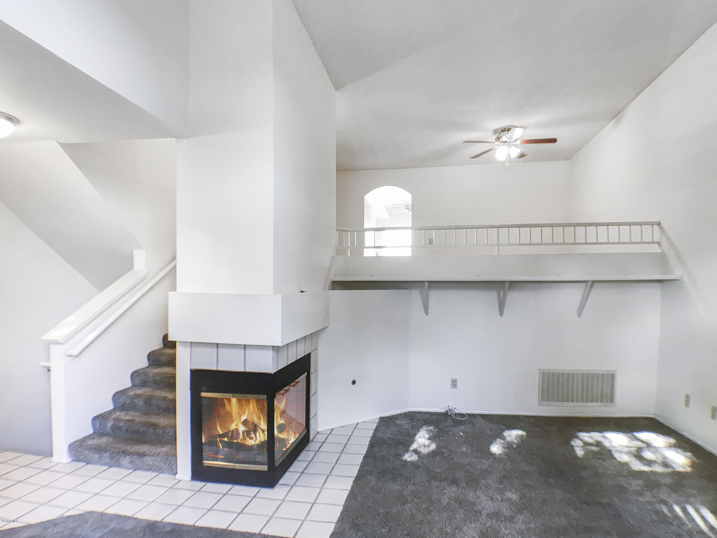 4975 Telephone Road Ventura, CA 93003 - Photo 5 of 31 a living room with furniture and a fireplace
