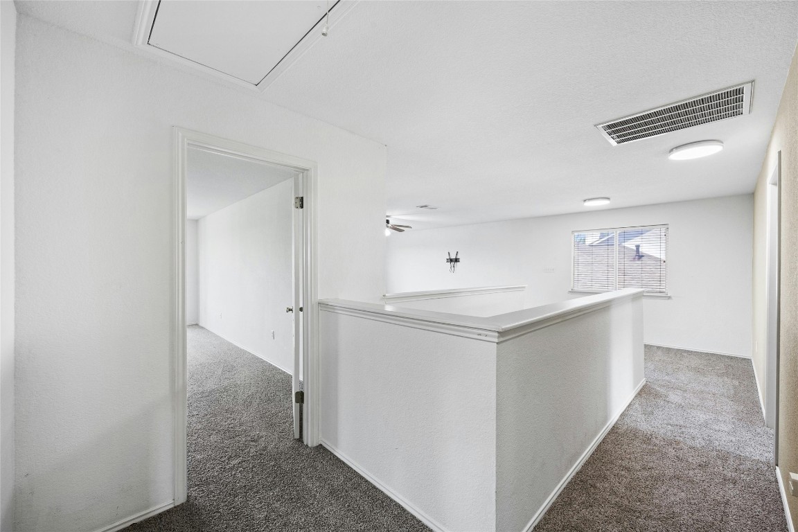 3618 Windhill Loop Round Rock, TX 78681 - Photo 14 of 30 a bathroom with a granite countertop sink and a mirror