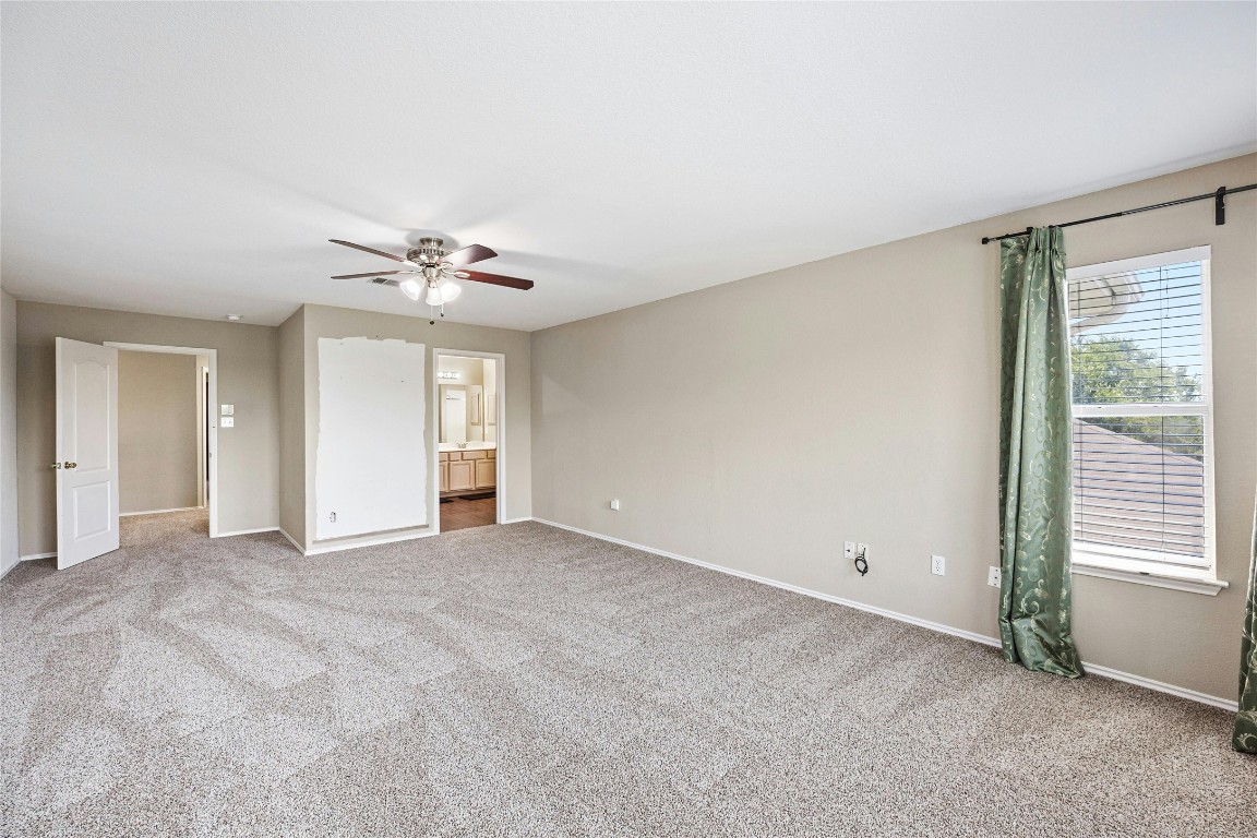3618 Windhill Loop Round Rock, TX 78681 - Photo 17 of 30 a view of an empty room with a window