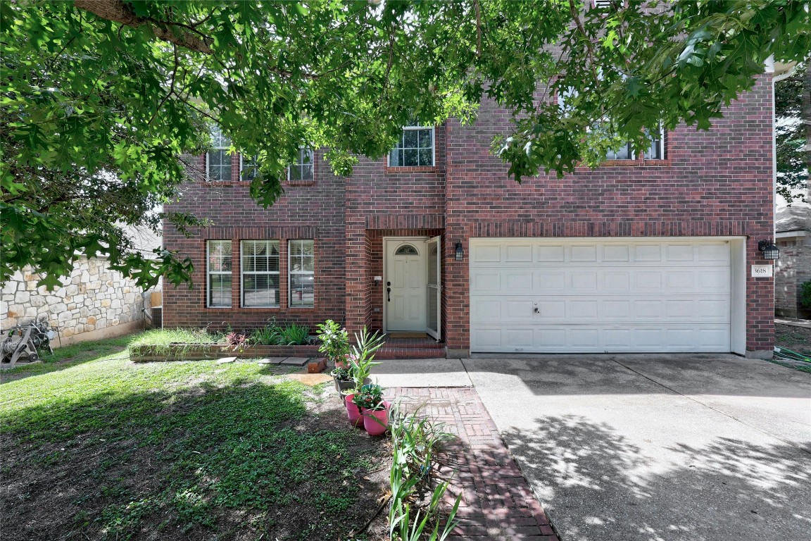 3618 Windhill Loop Round Rock, TX 78681 - Photo 2 of 30 a front view of a house with a yard