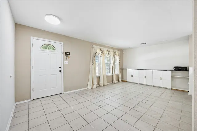 a view of a livingroom with an entryway