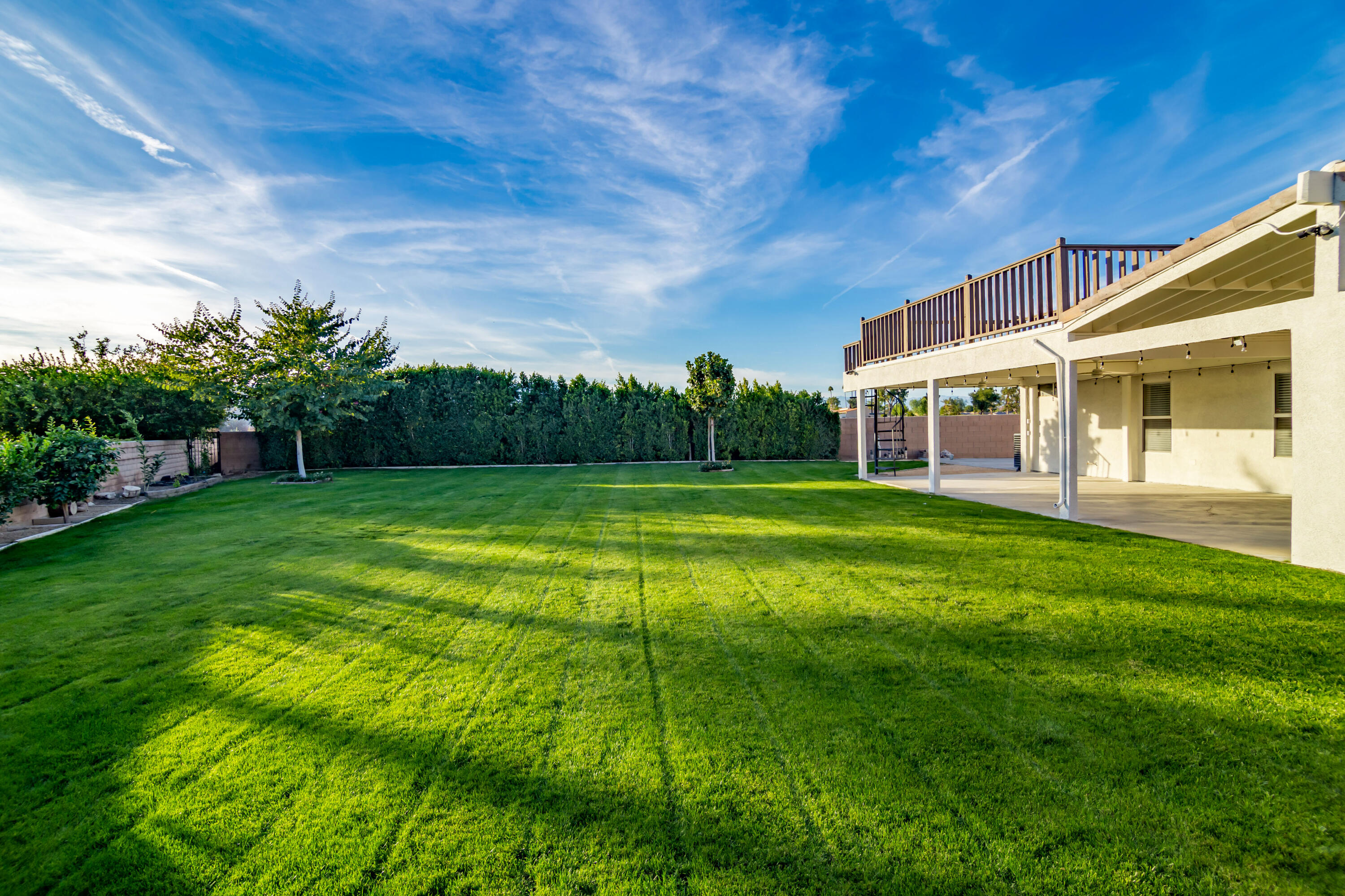 80265 Moonshadow Drive Indio, CA 92201 - Photo 13 of 32 a view of a house with a big yard