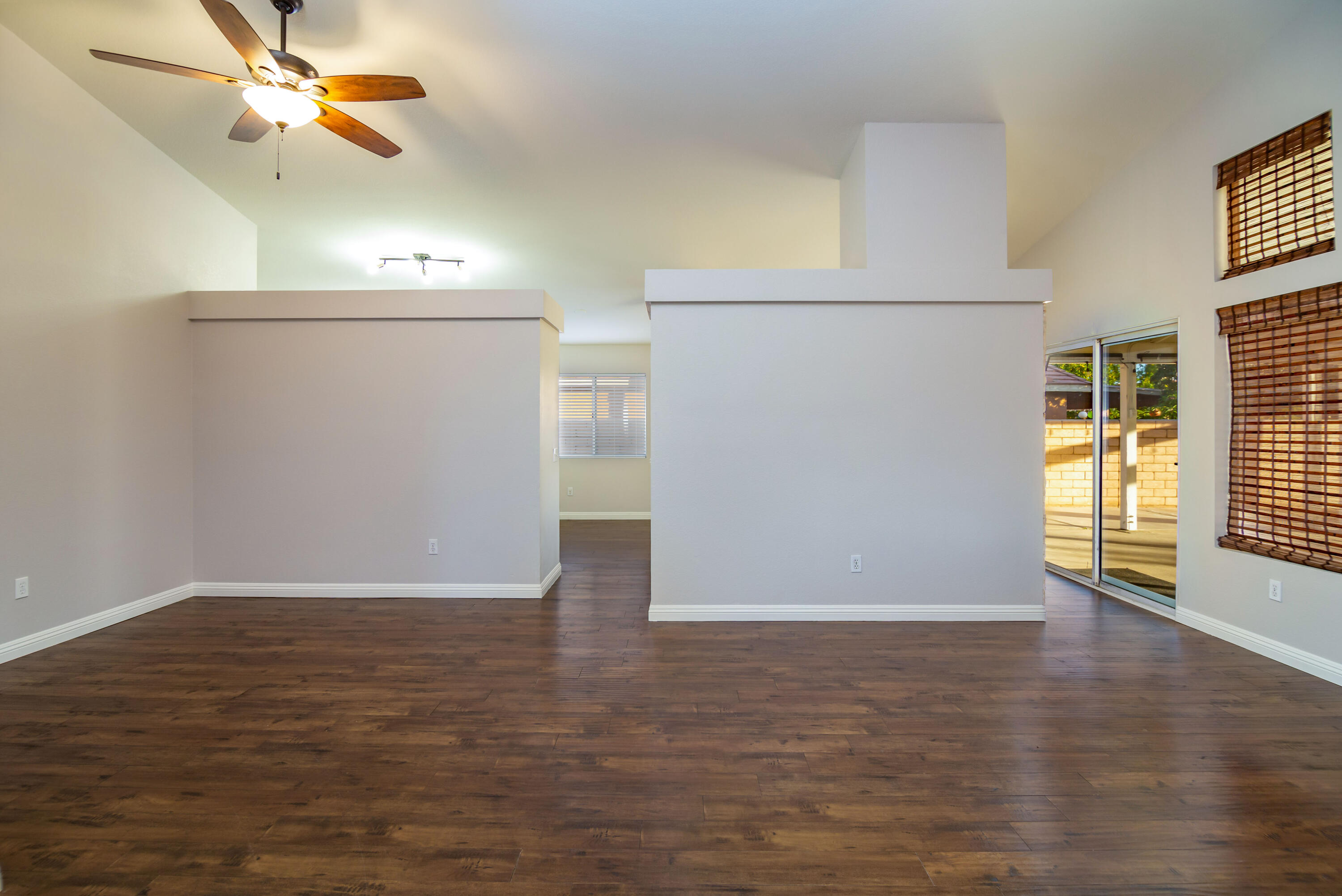 80265 Moonshadow Drive Indio, CA 92201 - Photo 17 of 32 wooden floor in an empty room with a window