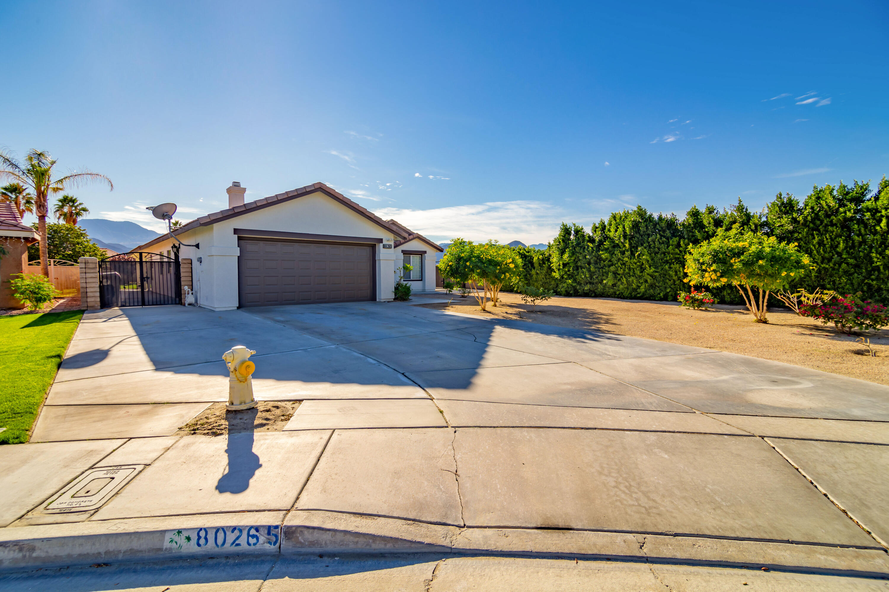 80265 Moonshadow Drive Indio, CA 92201 - Photo 2 of 32 a view of a house with entertaining space