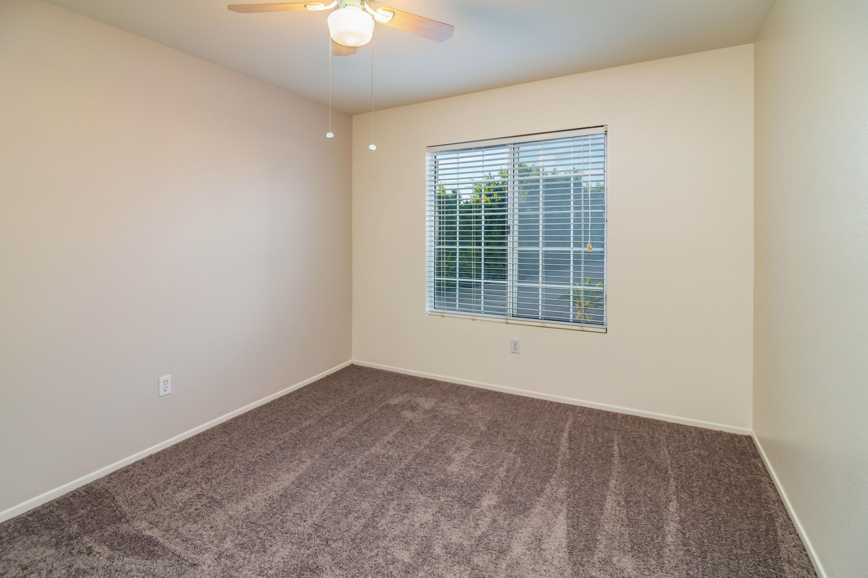 80265 Moonshadow Drive Indio, CA 92201 - Photo 26 of 32 an empty room with a window
