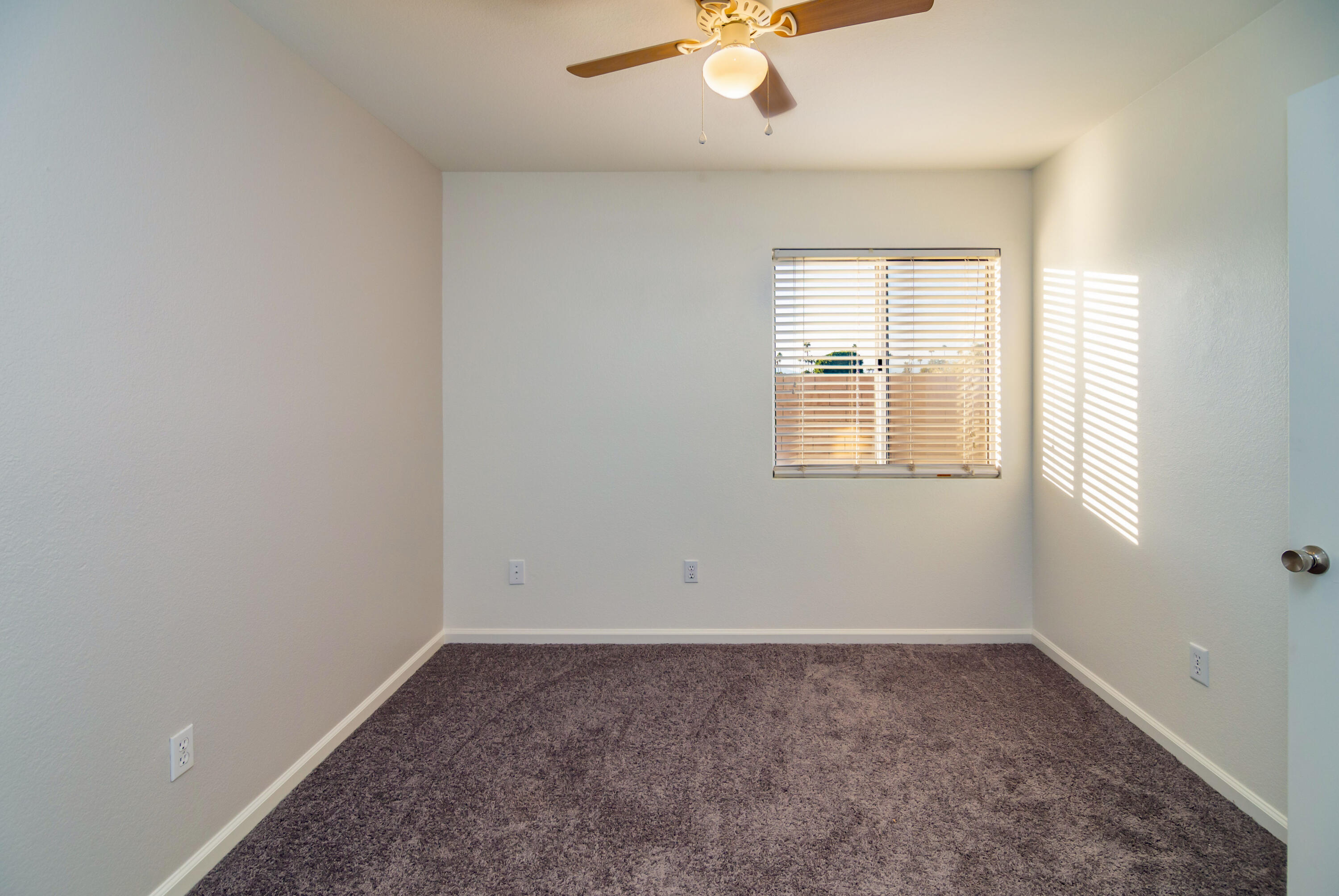80265 Moonshadow Drive Indio, CA 92201 - Photo 27 of 32 an empty room with a window
