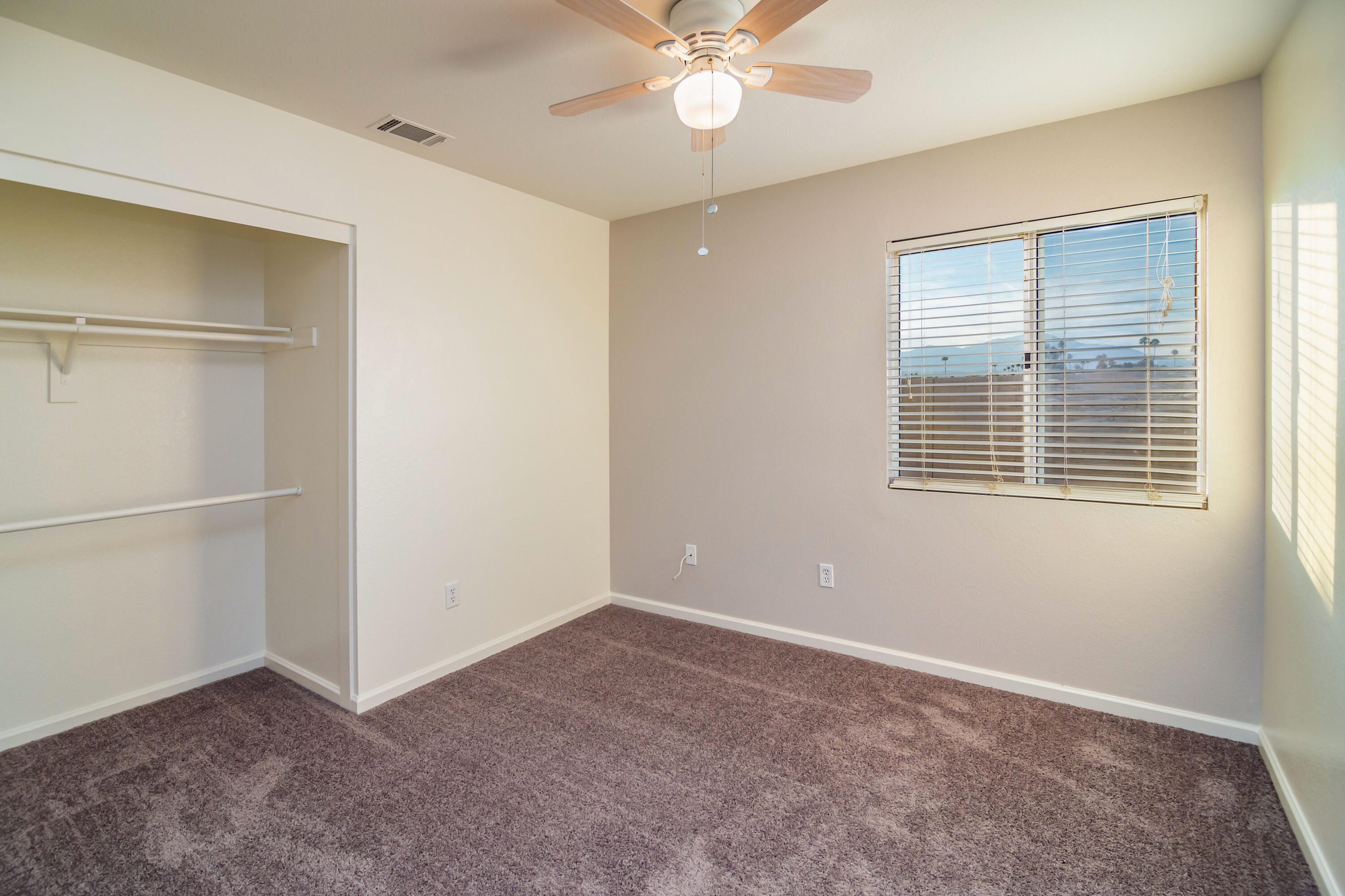 80265 Moonshadow Drive Indio, CA 92201 - Photo 28 of 32 a view of an empty room with a window