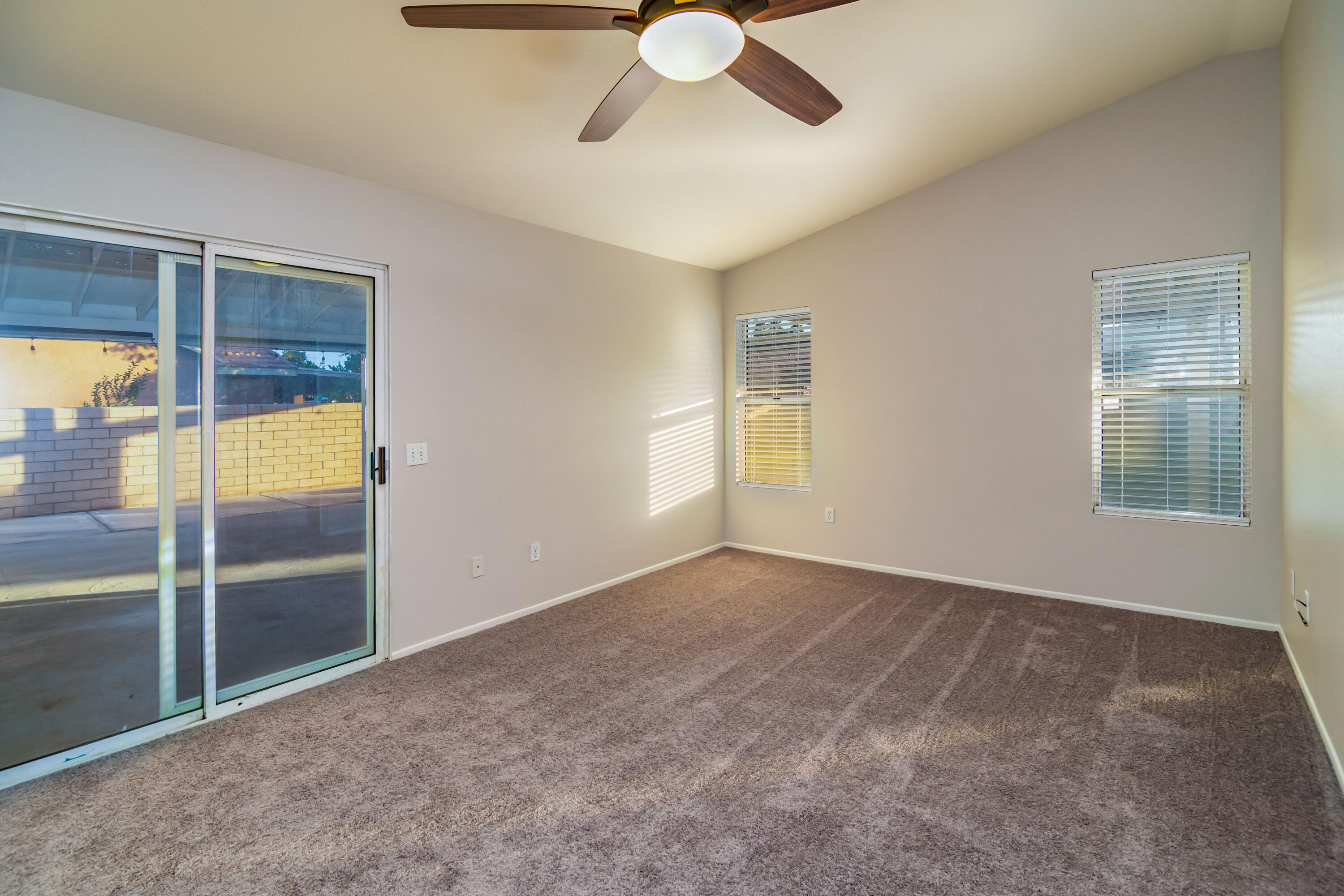 80265 Moonshadow Drive Indio, CA 92201 - Photo 29 of 32 a view of an empty room with a window