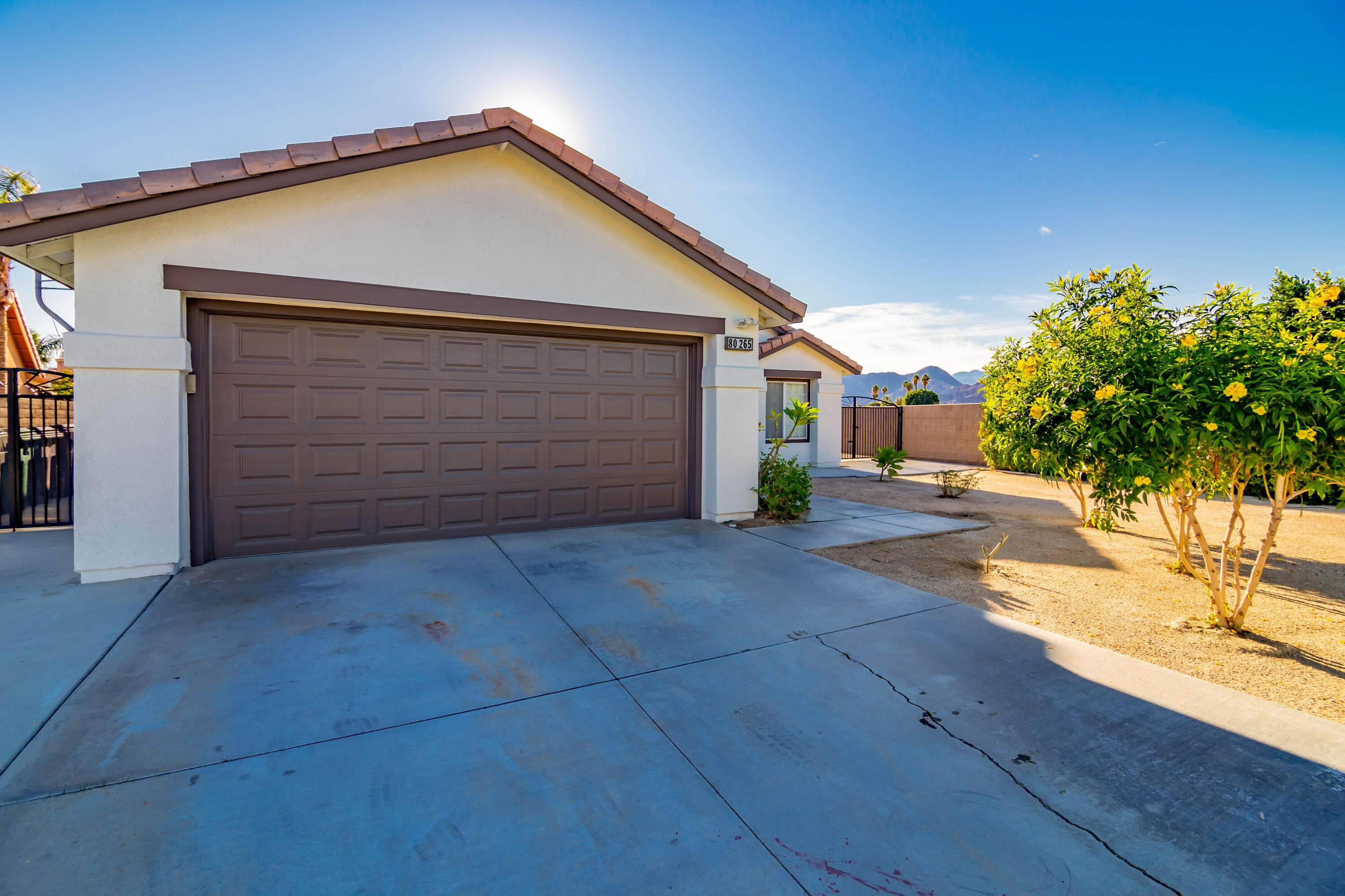 80265 Moonshadow Drive Indio, CA 92201 - Photo 4 of 32 a view of backyard of house