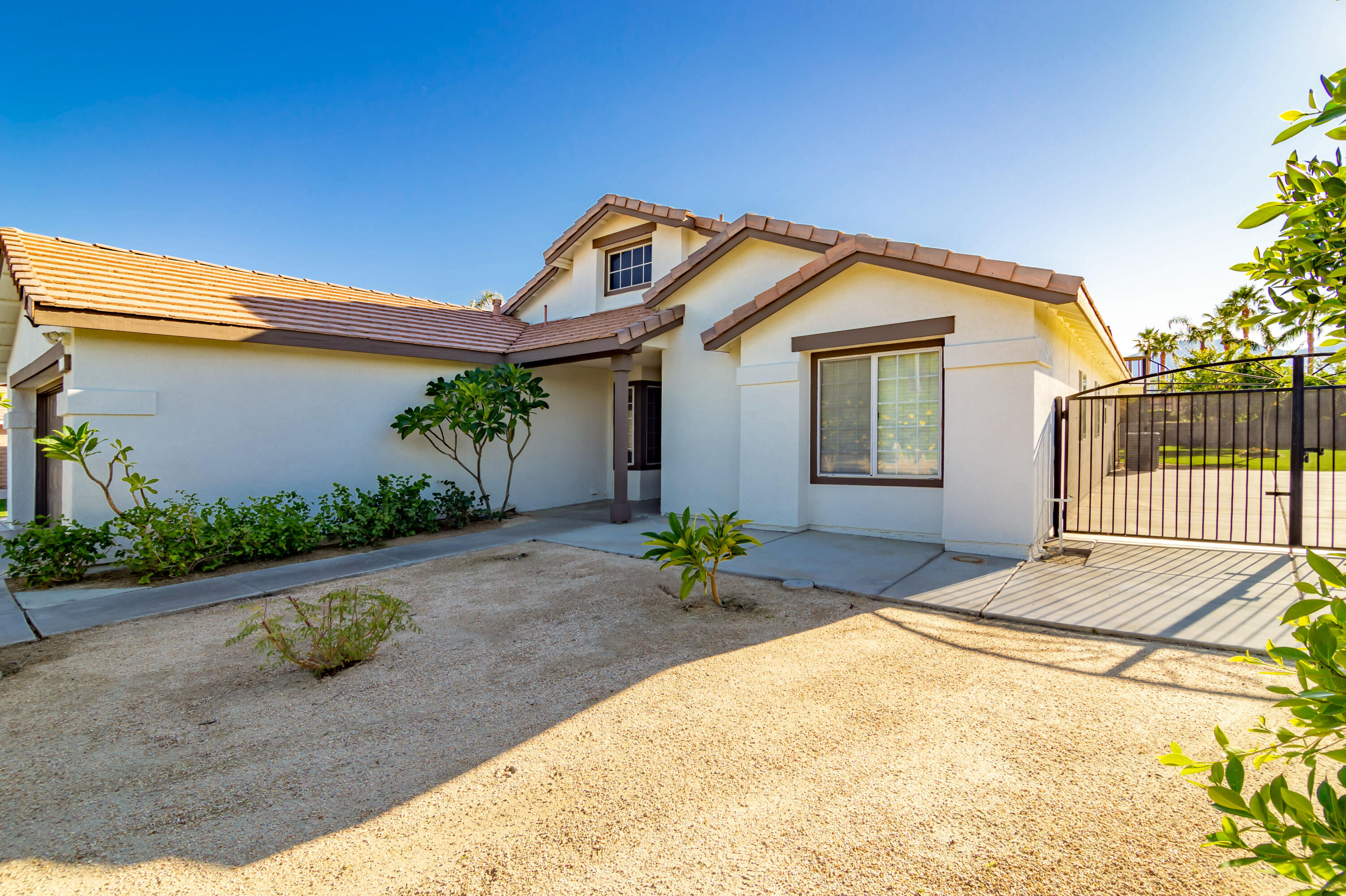 80265 Moonshadow Drive Indio, CA 92201 - Photo 6 of 32 a house view with a outdoor space